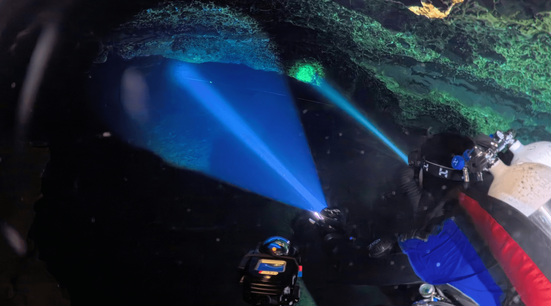 Diver in a cave with Phaser light