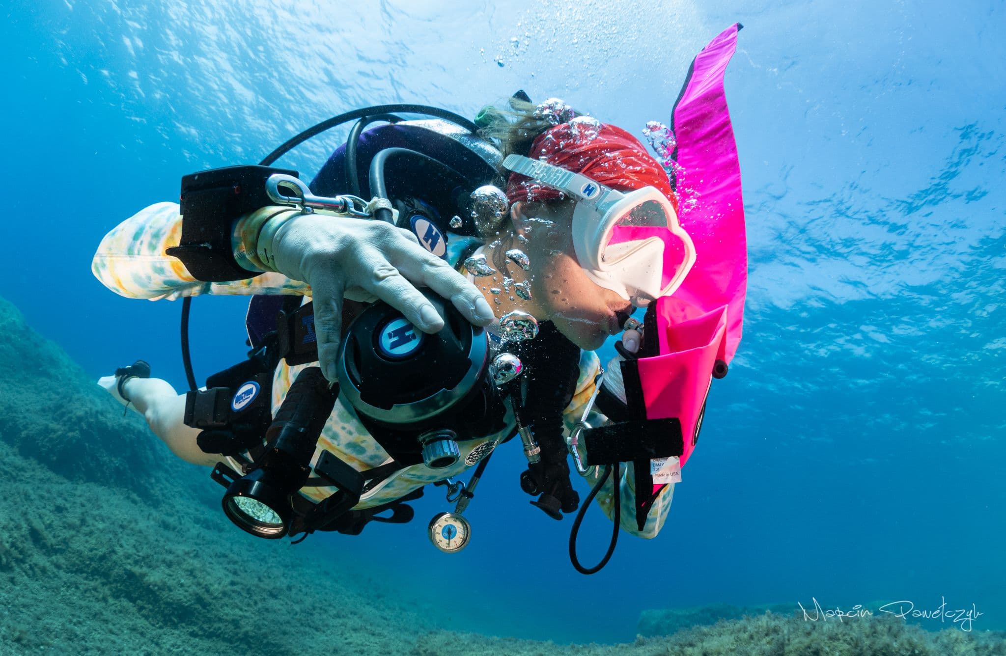 scuba diving girl halcyon buoy