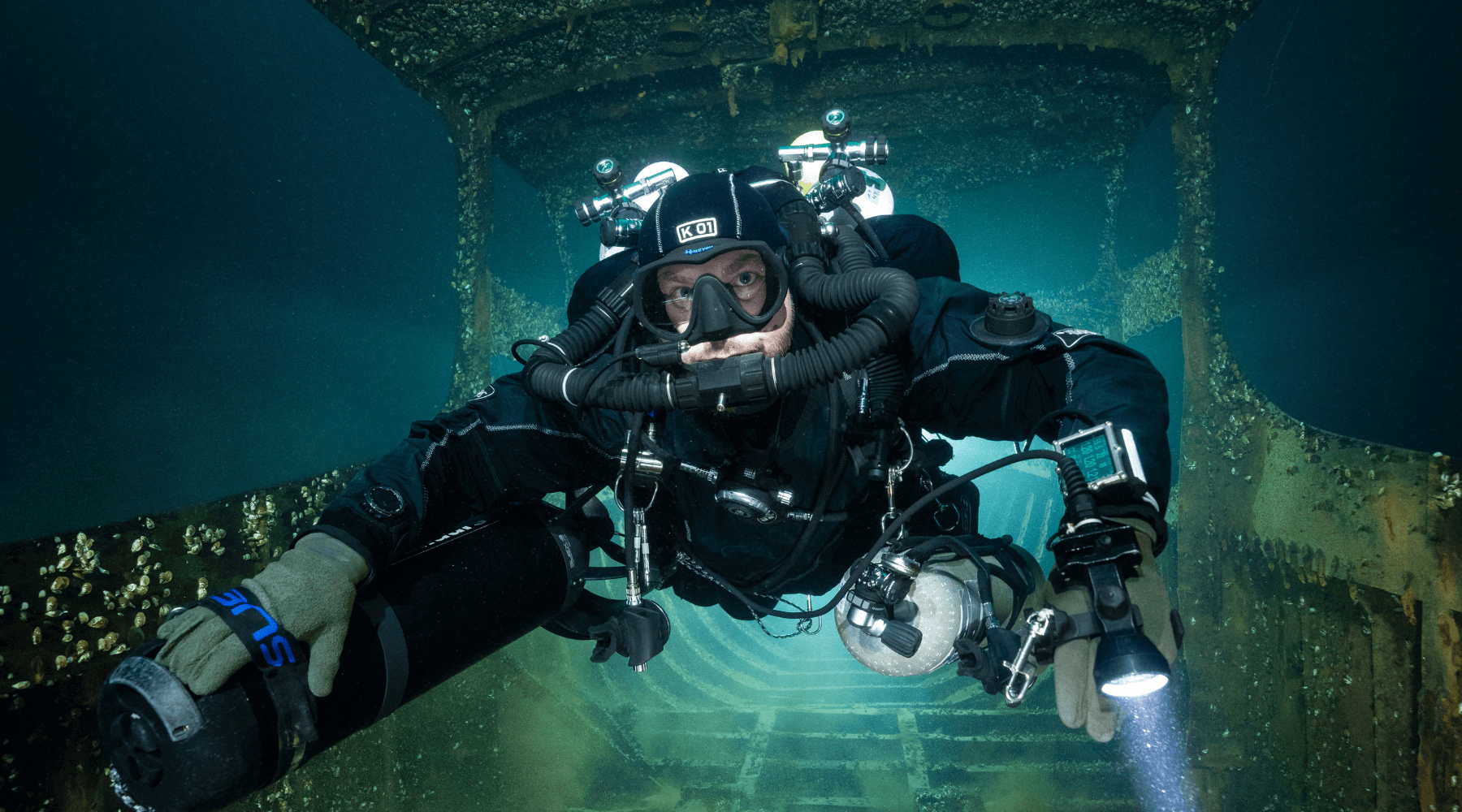 Diver with CCR wing underwater