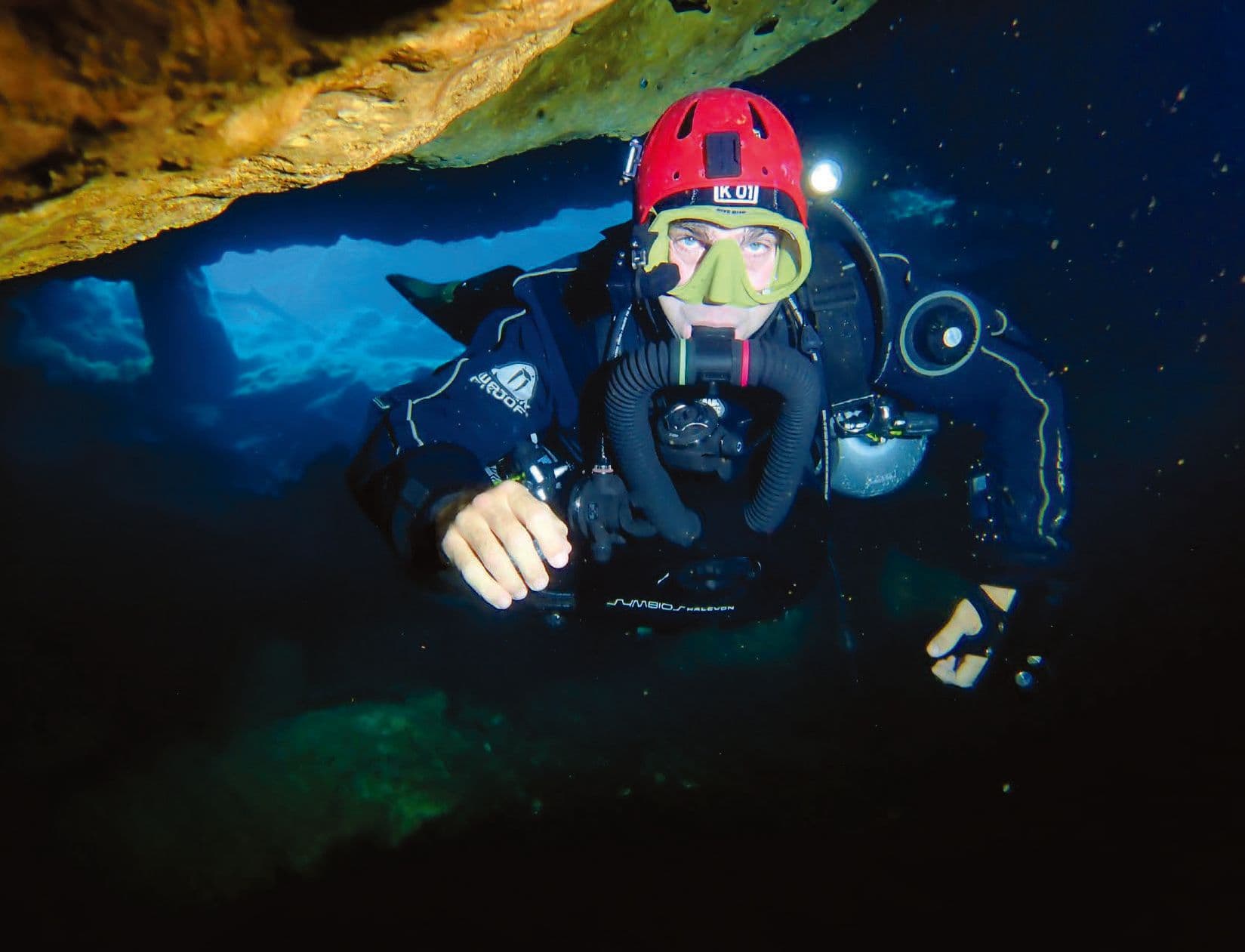 Diver with Symbios Chest Mount Rebreather in a cave